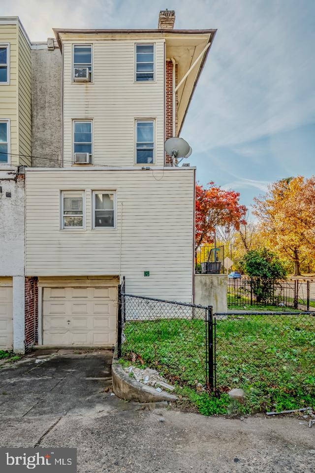 6243 Carpenter Street Philadelphia, PA 19143 - Photo 55 of 55 a view of a house with a yard