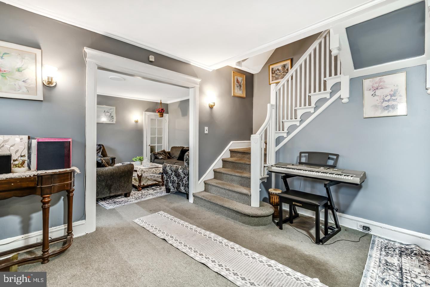 6243 Carpenter Street Philadelphia, PA 19143 - Photo 10 of 55 a living room with furniture and a wooden floor