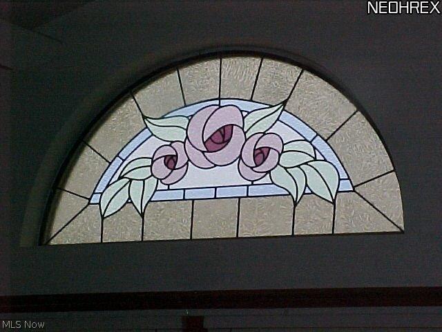 39284 Chestnut Ridge Road Elyria, OH 44035 - Photo 9 of 21 Stained glass window in family room.
