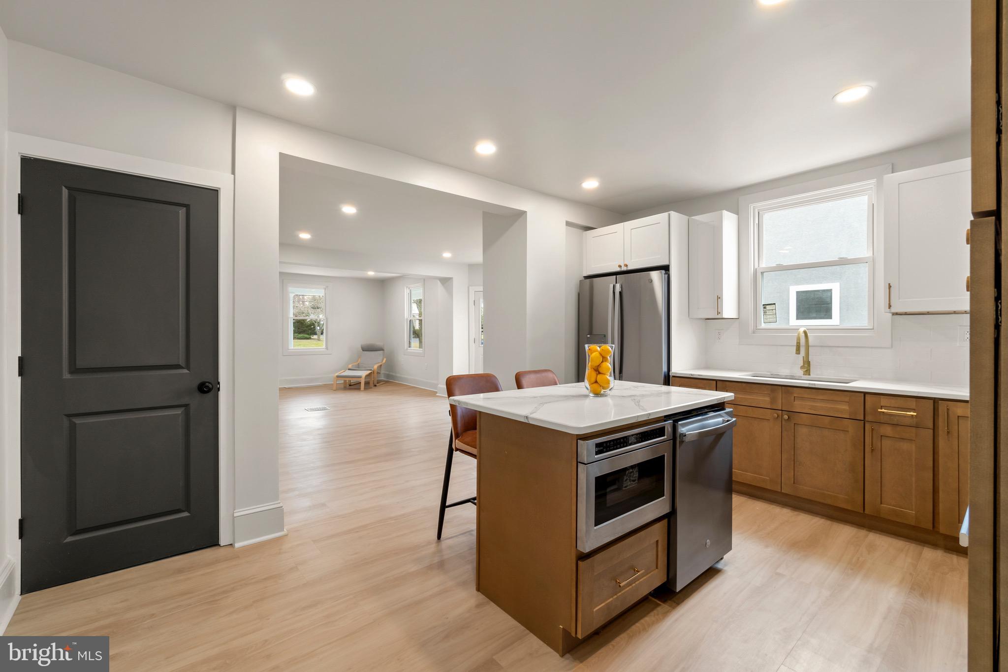 325 East 2nd Street Moorestown, NJ 08057 - Photo 11 of 39 a kitchen with a stove a refrigerator and a sink