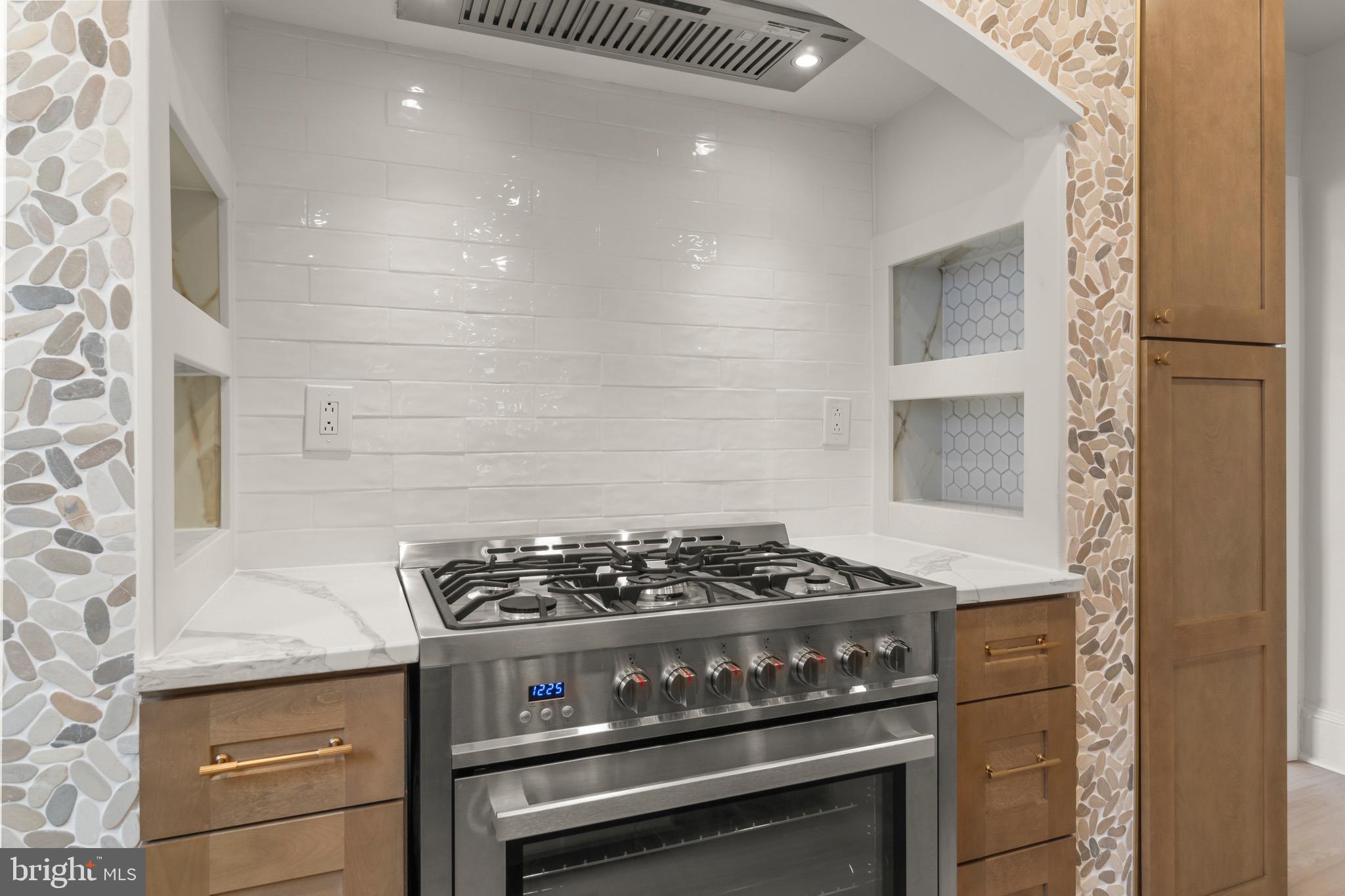 325 East 2nd Street Moorestown, NJ 08057 - Photo 13 of 39 a stove top oven sitting inside of a kitchen