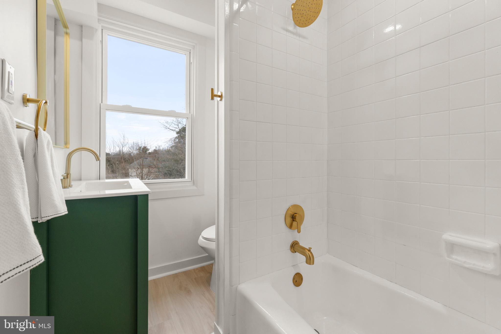 325 East 2nd Street Moorestown, NJ 08057 - Photo 16 of 39 a bathroom with a sink a toilet and a bathtub