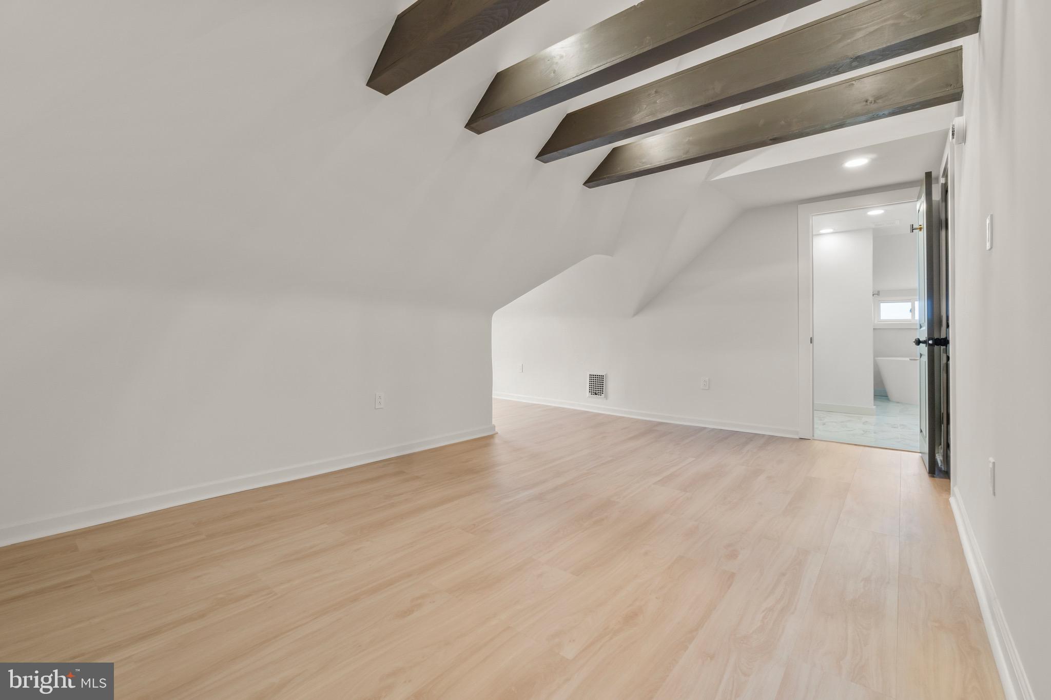 325 East 2nd Street Moorestown, NJ 08057 - Photo 22 of 39 an empty room with wooden floor and windows