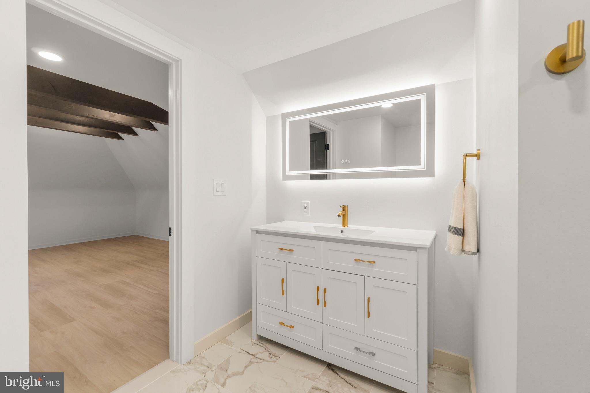 325 East 2nd Street Moorestown, NJ 08057 - Photo 25 of 39 a bathroom with a sink and a mirror