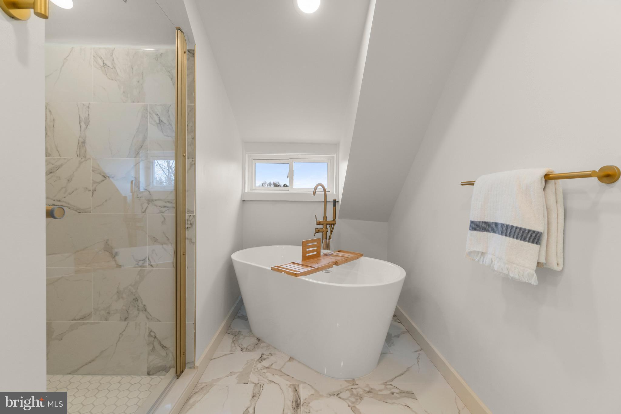 325 East 2nd Street Moorestown, NJ 08057 - Photo 26 of 39 a white bath tub sitting next to a white sink