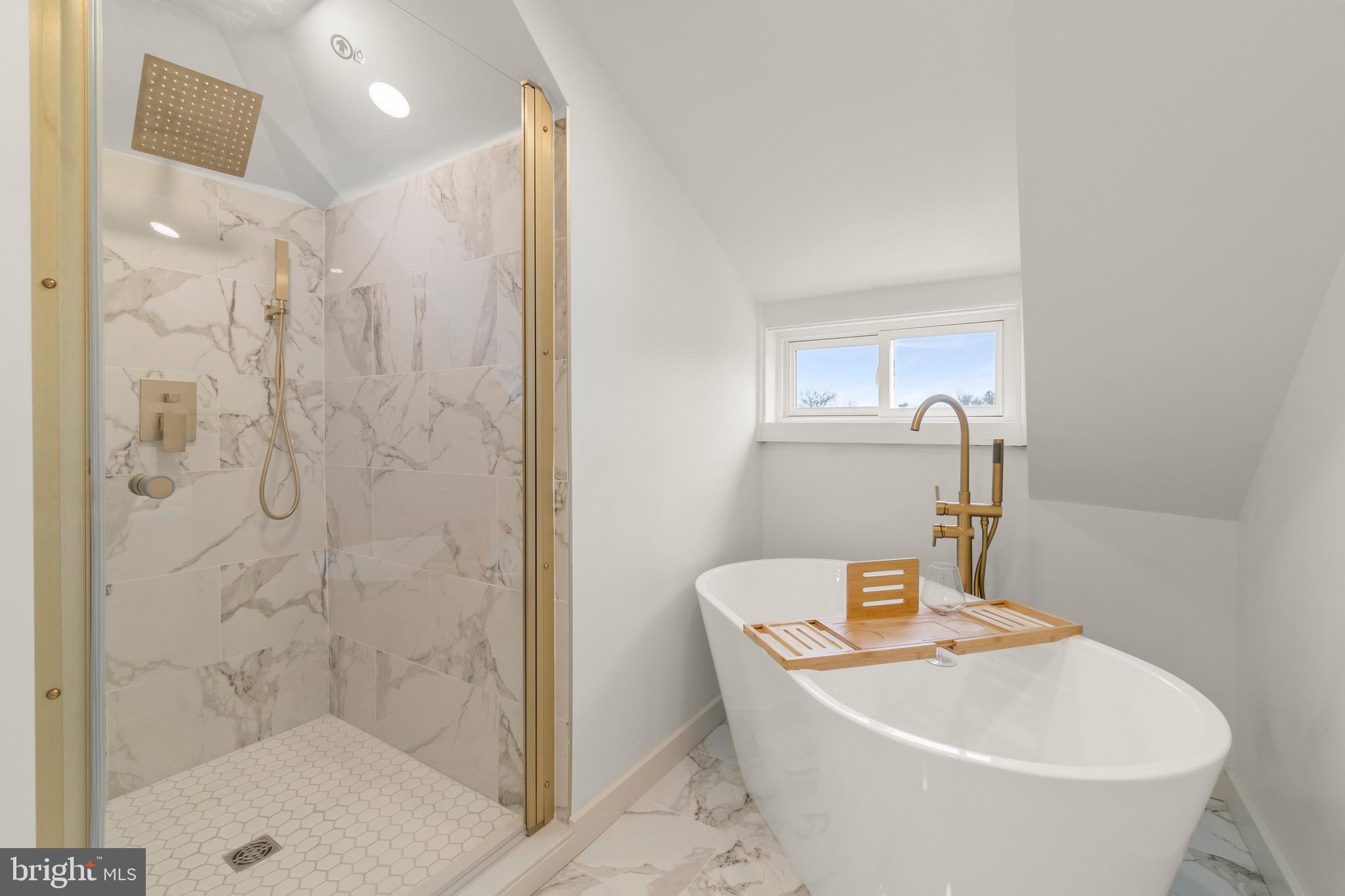 325 East 2nd Street Moorestown, NJ 08057 - Photo 27 of 39 a bathroom with a bathtub and shower