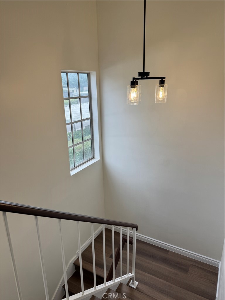 6 Columbia, Unit 2 Irvine, CA 92612 - Photo 16 of 25 a view of entryway with wooden floor