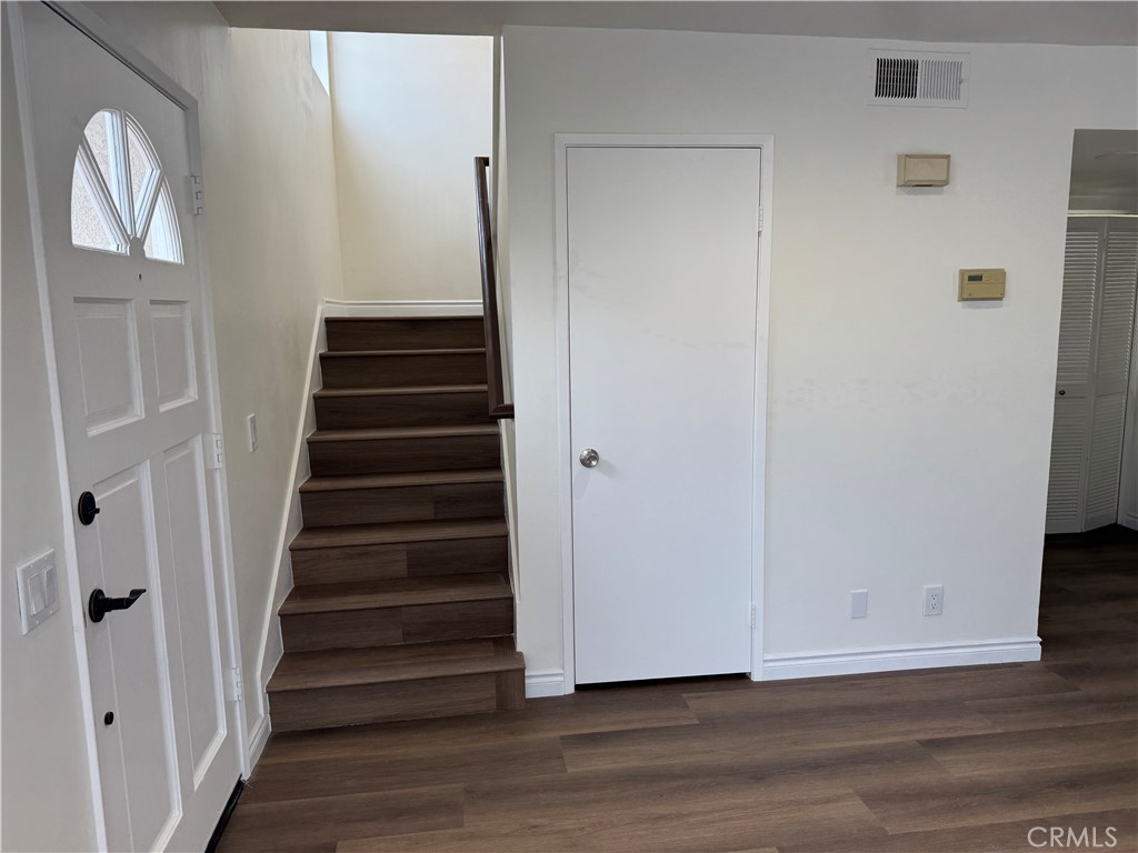 6 Columbia, Unit 2 Irvine, CA 92612 - Photo 6 of 25 a view of an entryway with wooden floor