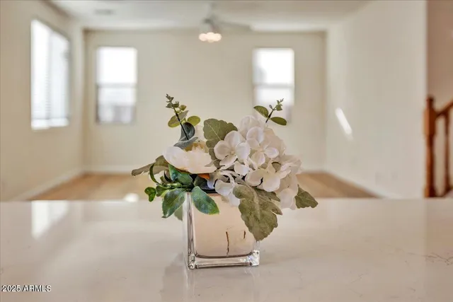 a vase of flowers sitting on a table