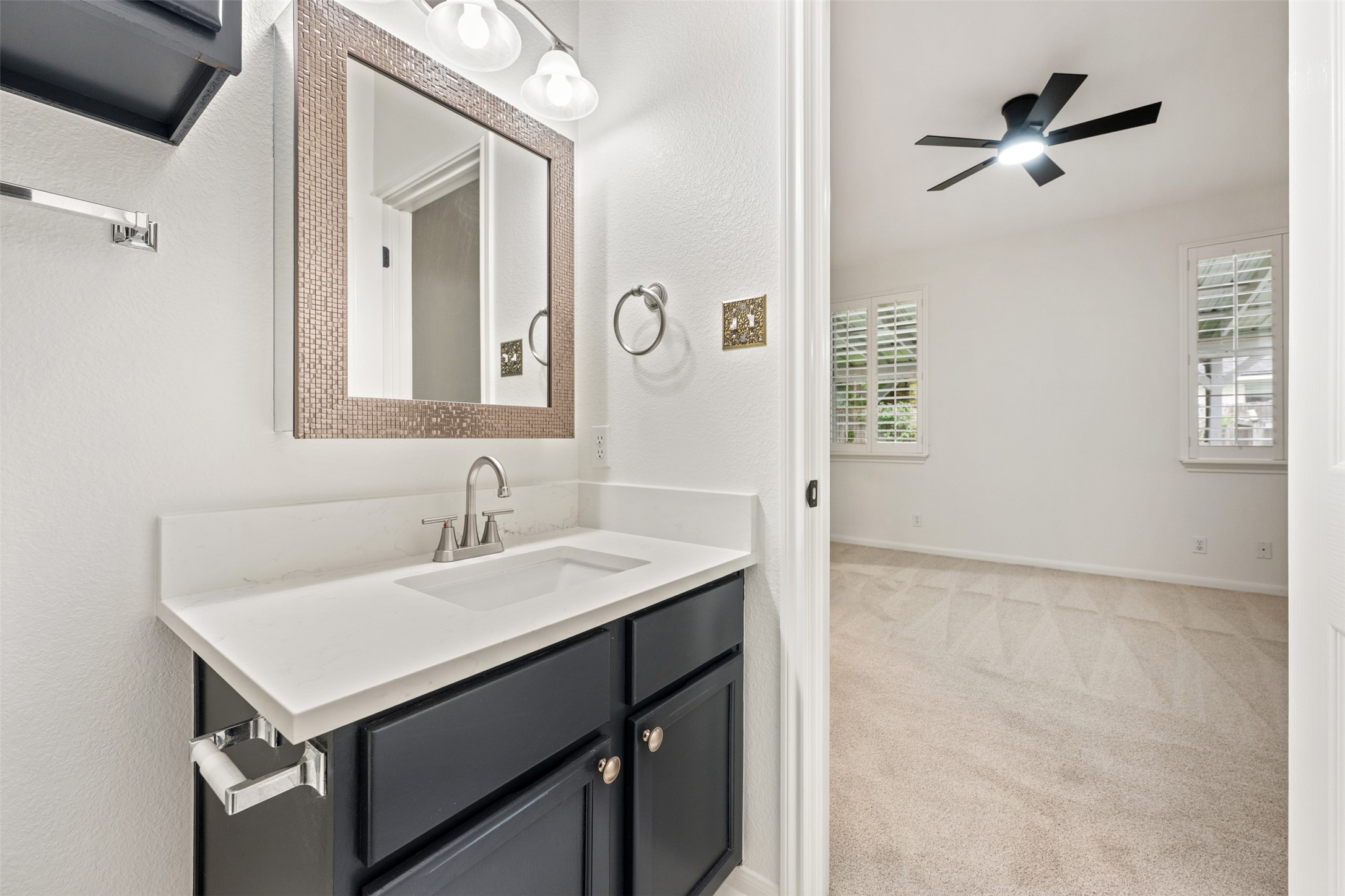 2429 A Curry Loop Round Rock, TX 78664 - Photo 13 of 28 a bathroom with a sink and a mirror
