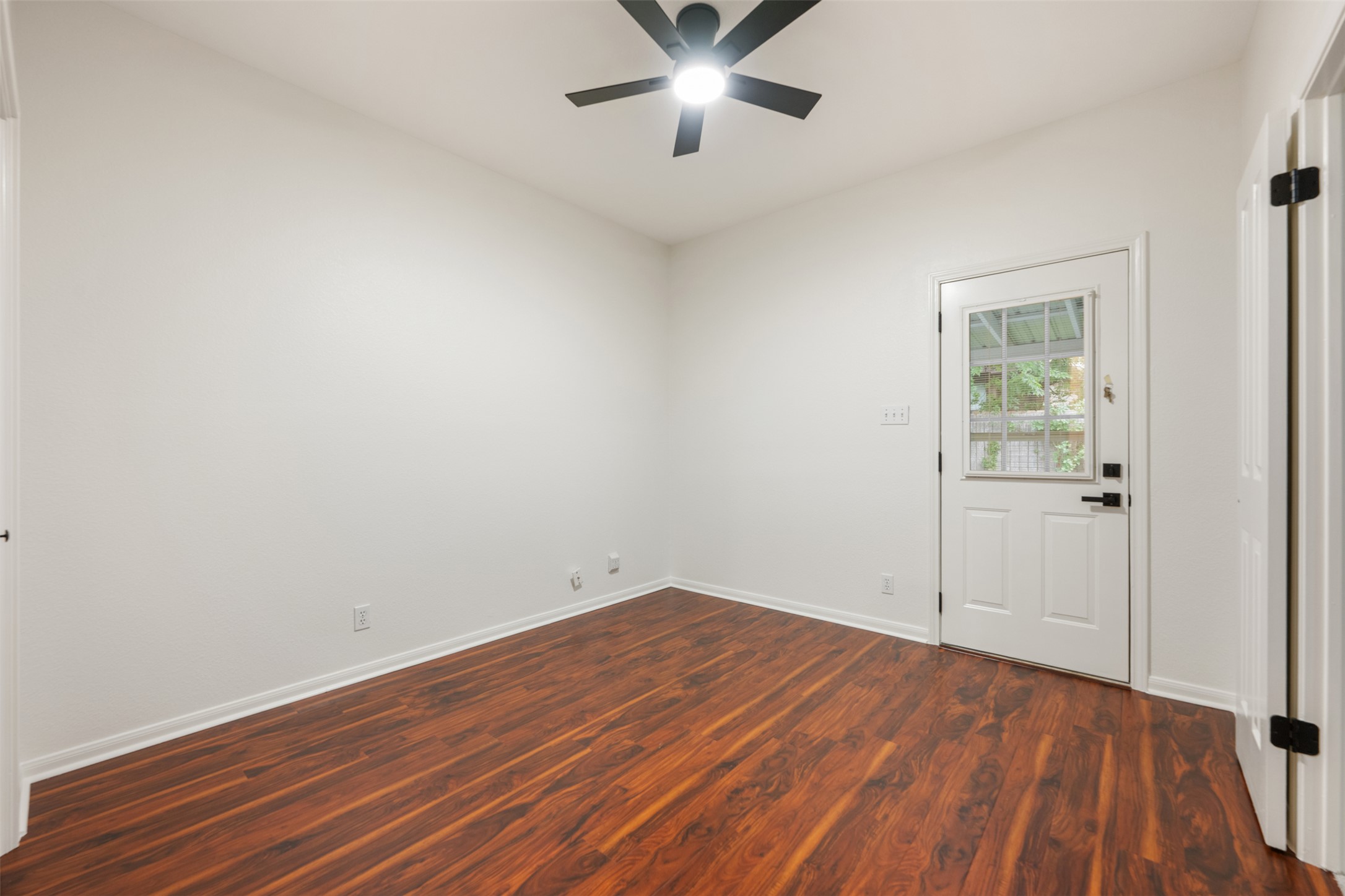 2429 A Curry Loop Round Rock, TX 78664 - Photo 14 of 28 wooden floor in an empty room with a window