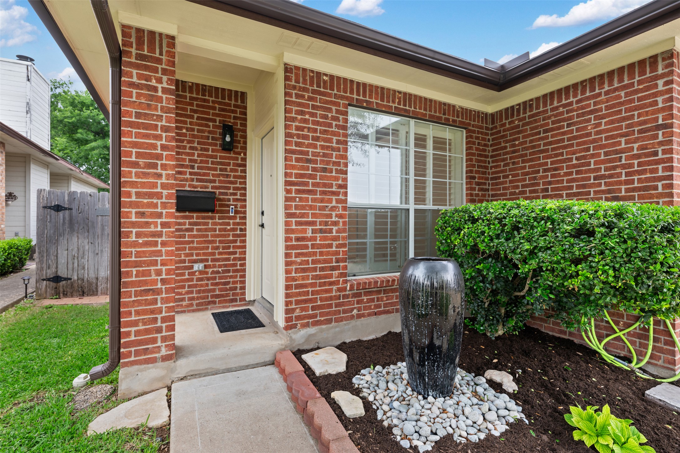 2429 A Curry Loop Round Rock, TX 78664 - Photo 2 of 28 a front view of a house with a yard