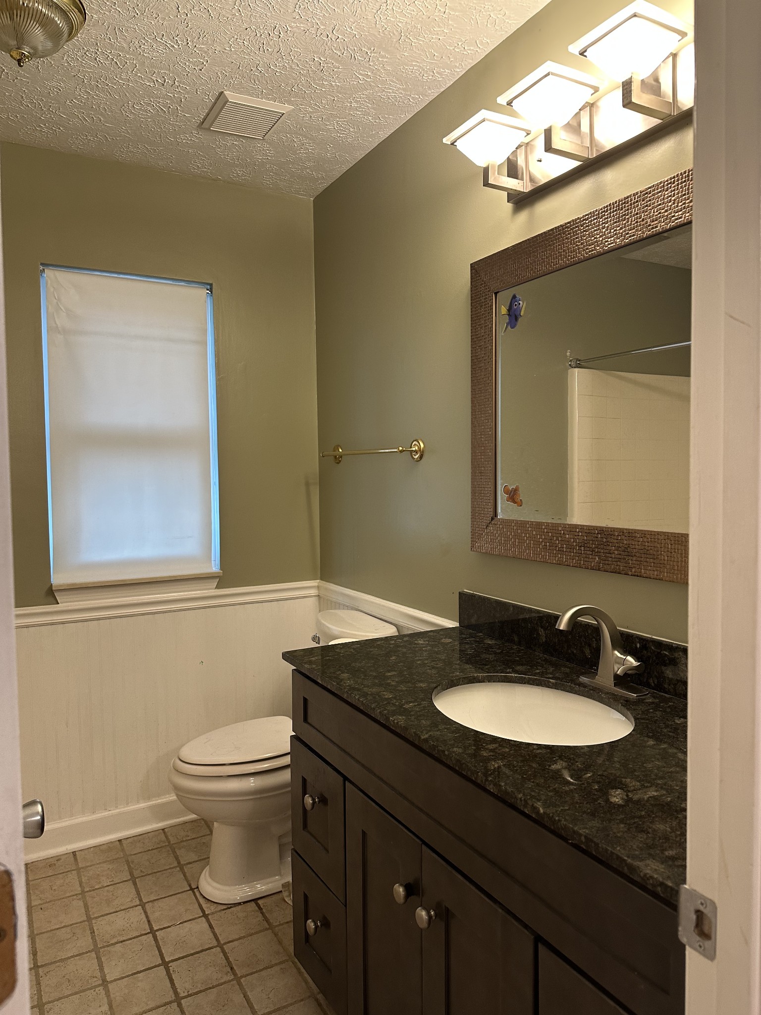 1612 Cedar Tree Lane Mount Juliet, TN 37122 - Photo 7 of 7 a bathroom with a granite countertop sink toilet and mirror