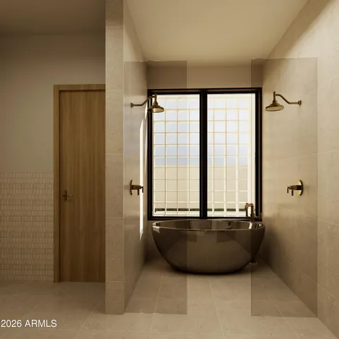 a living room with a large window and walk in closet