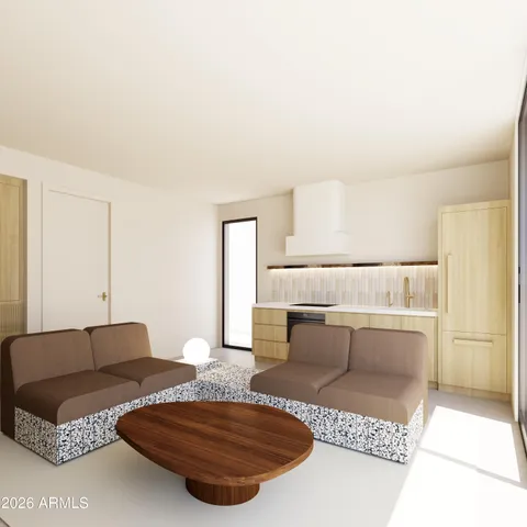 a living room with furniture and a rug