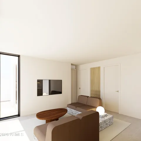 a bedroom with a bed and a couch