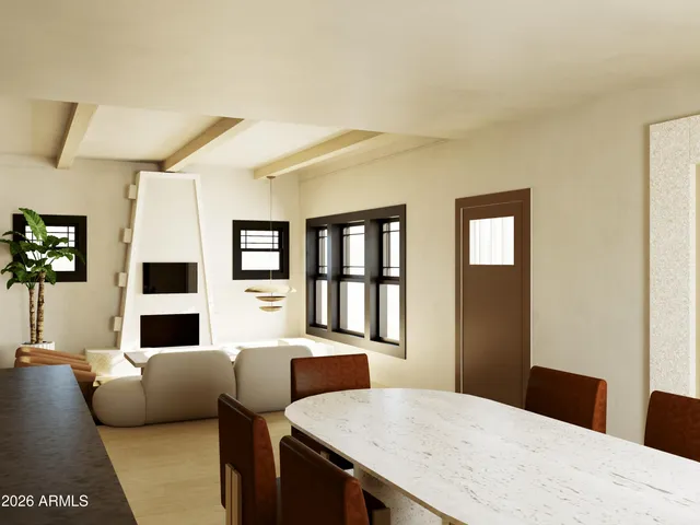 a bedroom with a bed and a couch