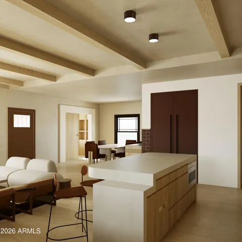 a living room with a couch and a large window