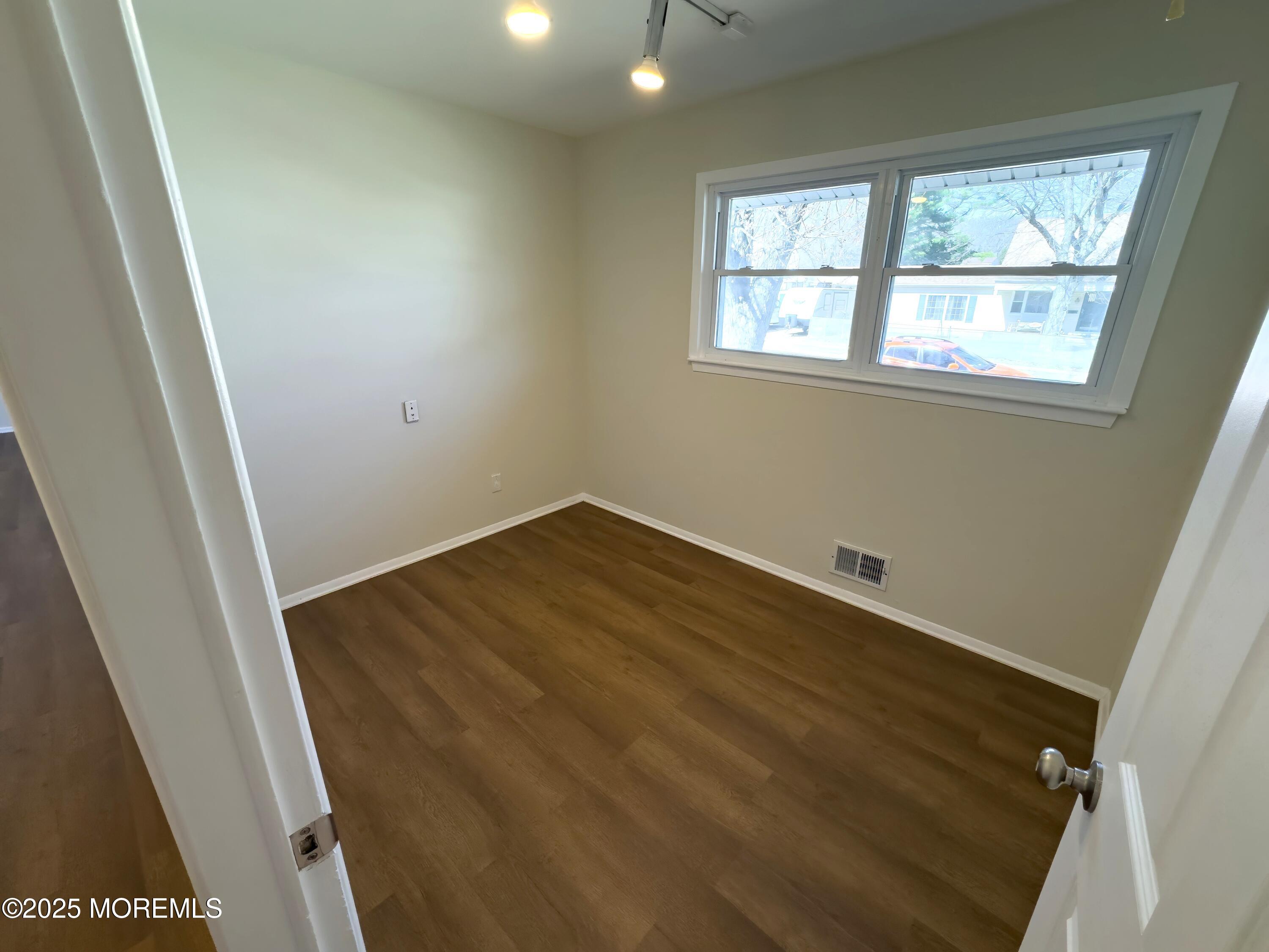 30 Bryant Drive Jackson, NJ 08527 - Photo 15 of 58 an empty room with a window
