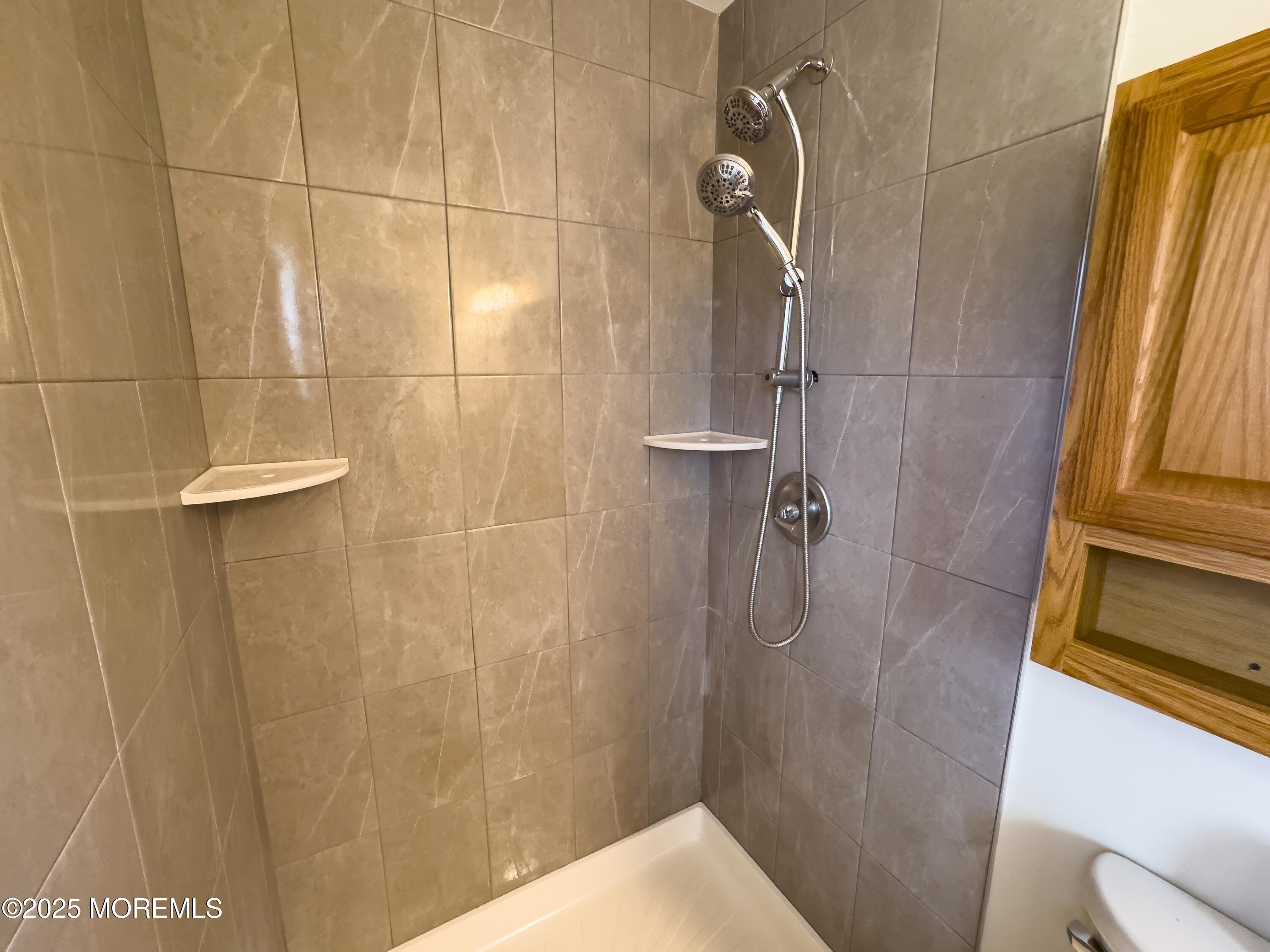 30 Bryant Drive Jackson, NJ 08527 - Photo 27 of 58 a bathroom with a shower