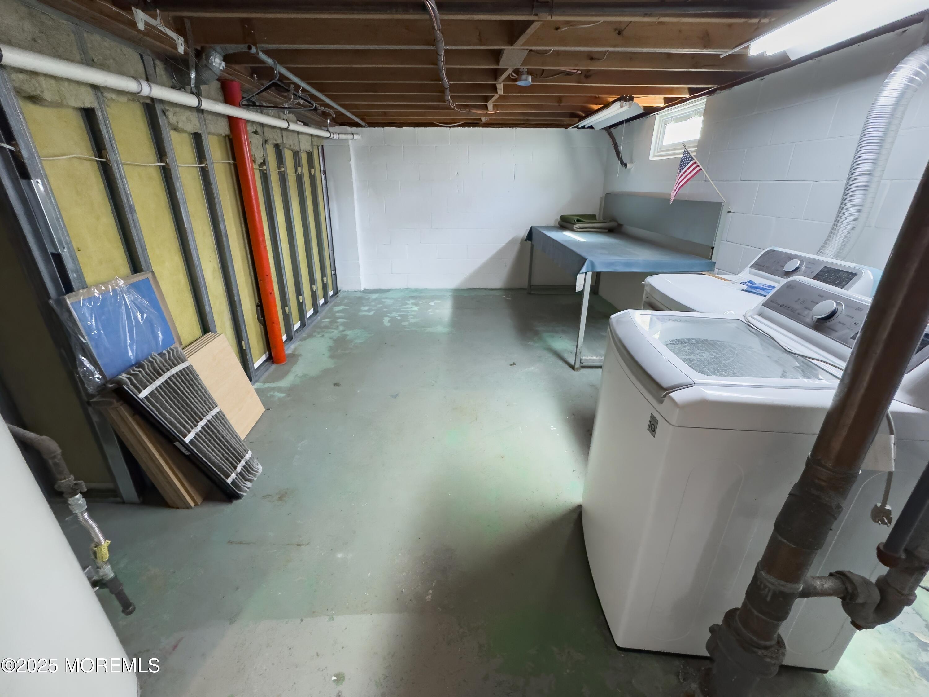 30 Bryant Drive Jackson, NJ 08527 - Photo 38 of 58 a utility room with sink dryer and washer