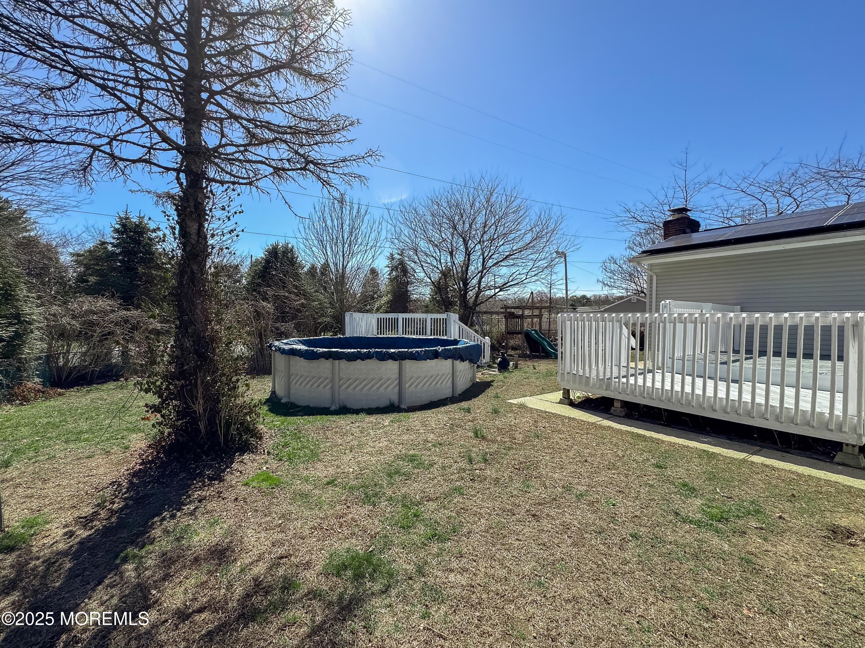 30 Bryant Drive Jackson, NJ 08527 - Photo 48 of 58 a view of a house with backyard and trees