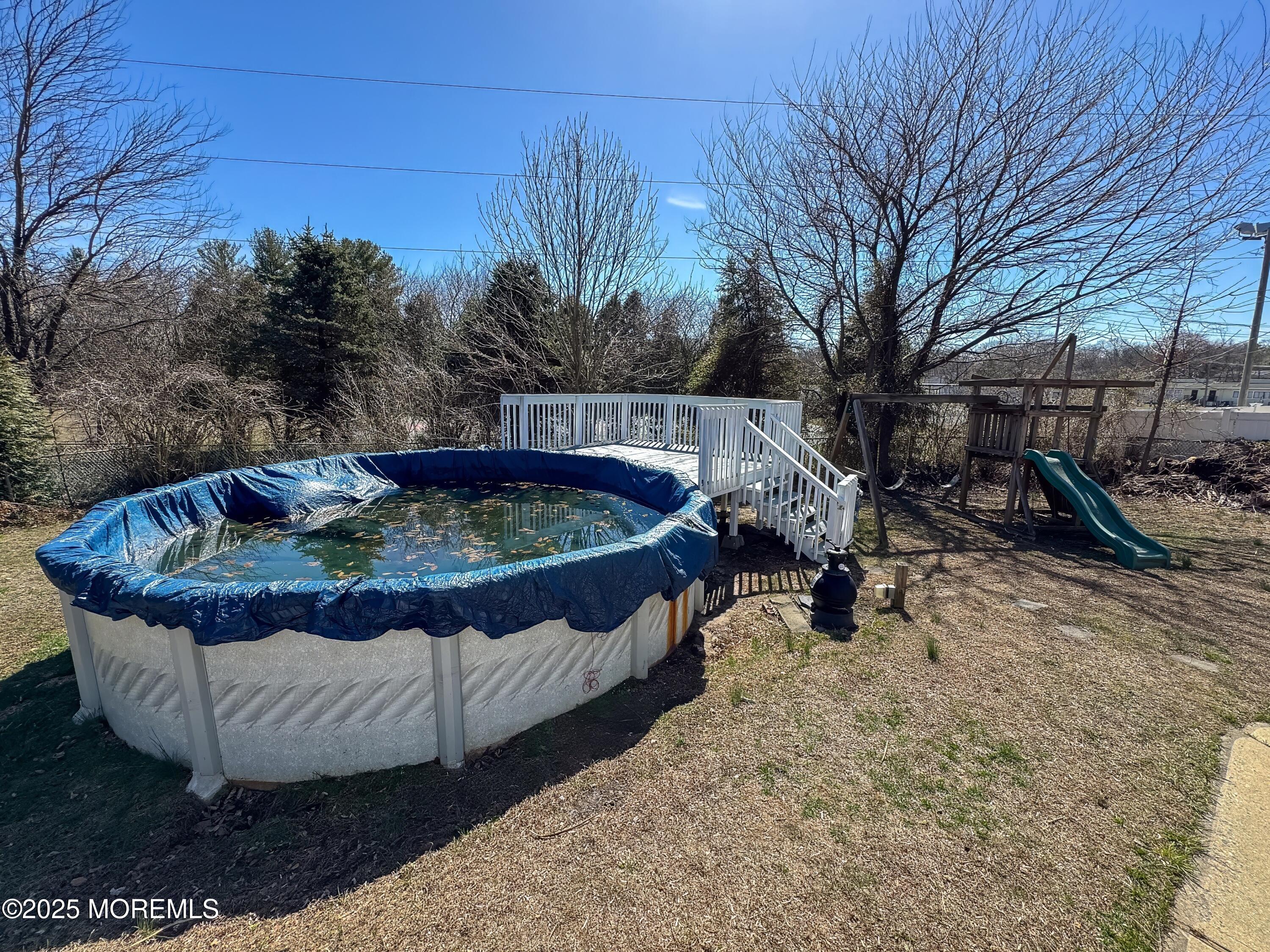 30 Bryant Drive Jackson, NJ 08527 - Photo 50 of 58 a view of a backyard with a tub