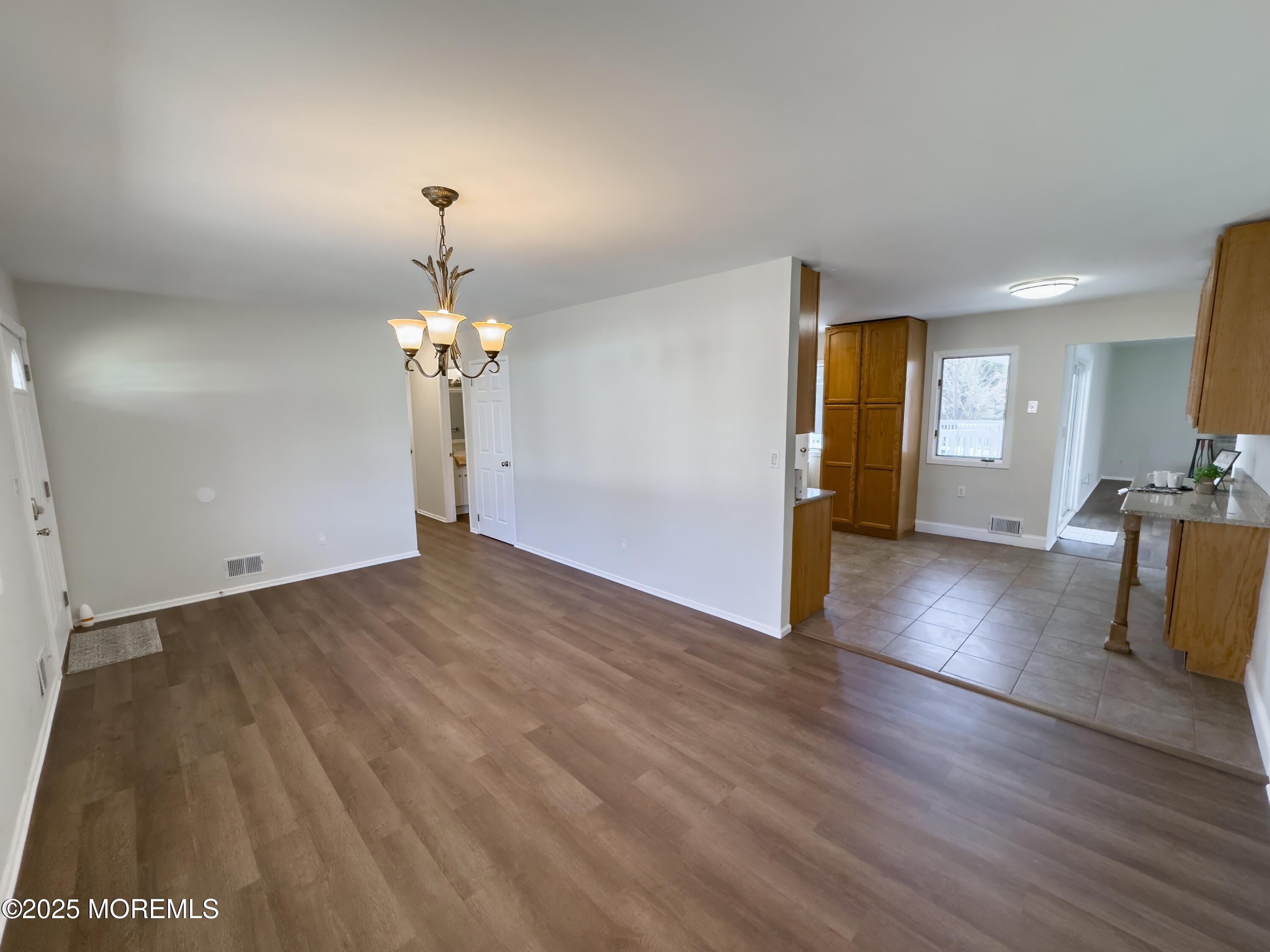30 Bryant Drive Jackson, NJ 08527 - Photo 7 of 58 a view of a livingroom with a chandelier