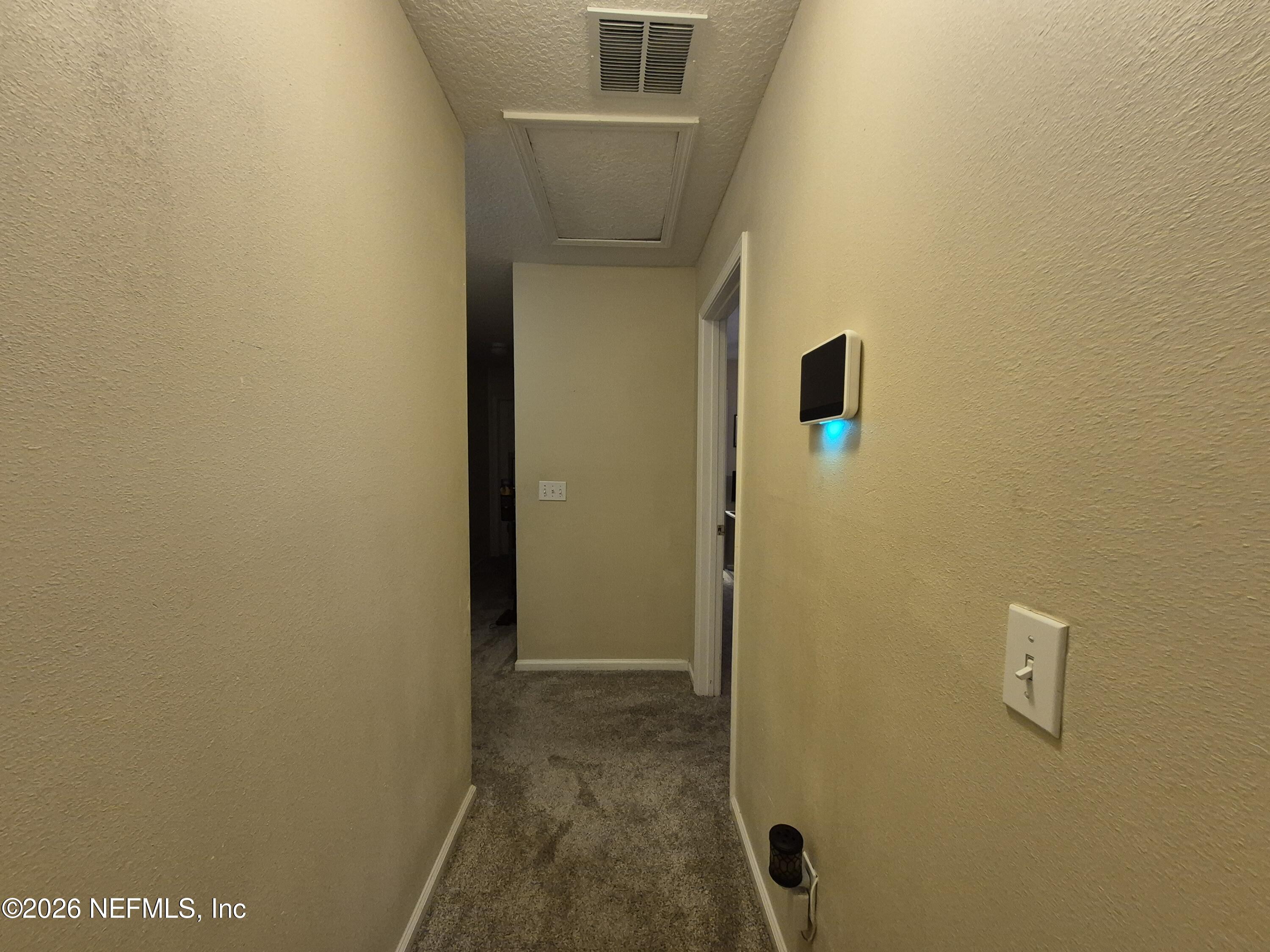 7939 Melvin Road Jacksonville, FL 32210 - Photo 21 of 36 Master Bedroom Hallway