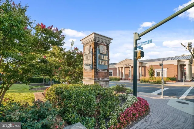 a view of a building with a yard
