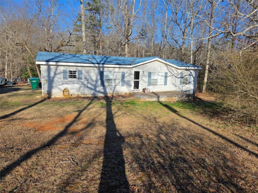 145 Rock Forge Court Jefferson, GA 30549 - Photo 1 of 22 a front view of a house with a yard