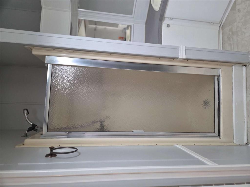 145 Rock Forge Court Jefferson, GA 30549 - Photo 13 of 22 a bathroom with a glass shower door and a sink