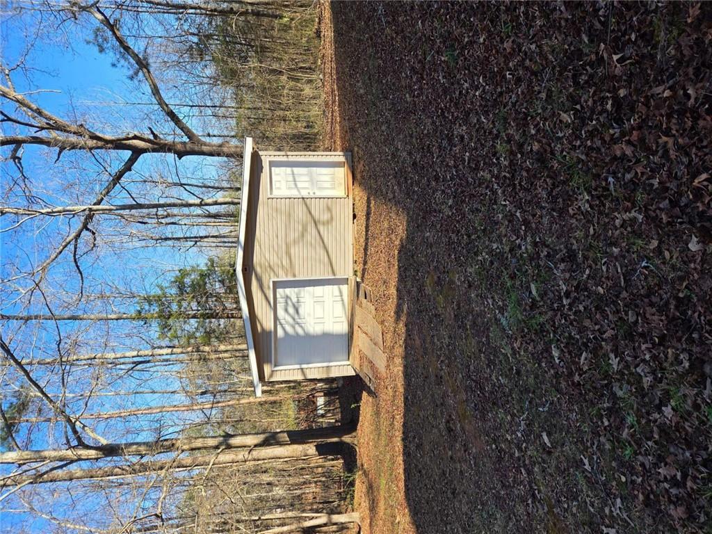 145 Rock Forge Court Jefferson, GA 30549 - Photo 20 of 22 a view of a house with a yard