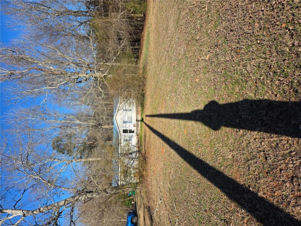 145 Rock Forge Court Jefferson, GA 30549 - Photo 2 of 22 a view of a pathway with a yard