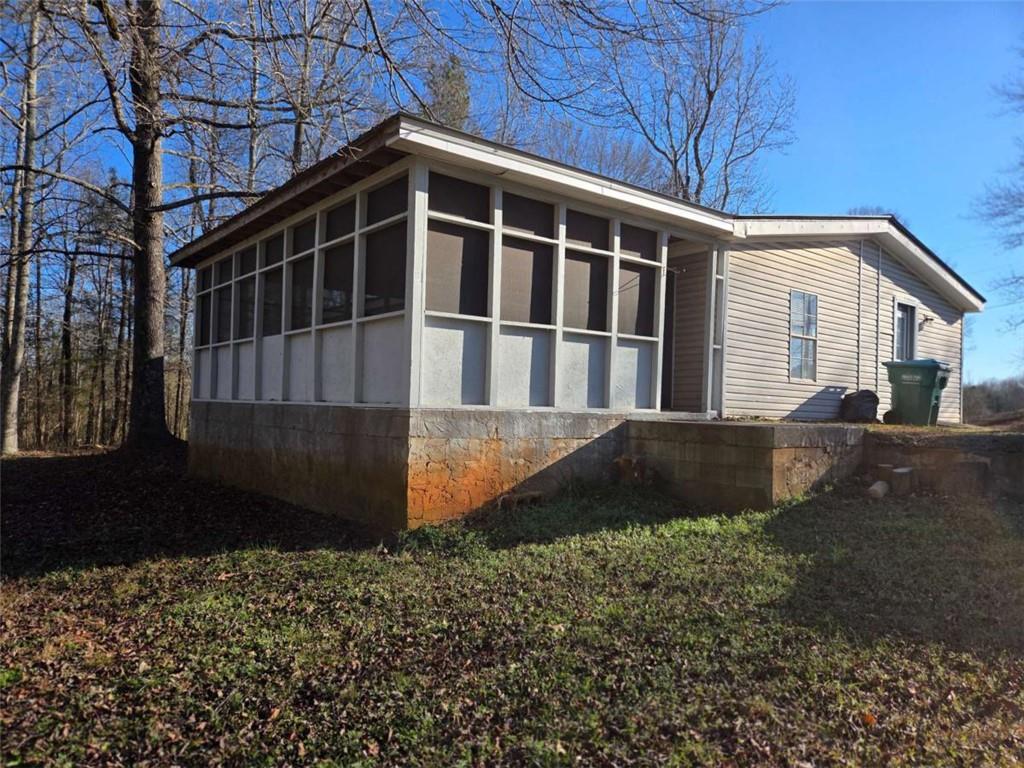 145 Rock Forge Court Jefferson, GA 30549 - Photo 3 of 22 a front view of a house with a yard