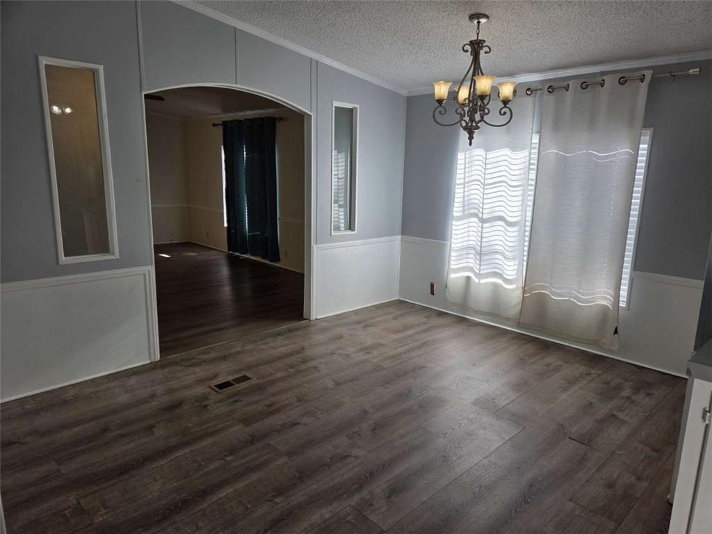 145 Rock Forge Court Jefferson, GA 30549 - Photo 8 of 22 wooden floor in an empty room with a window