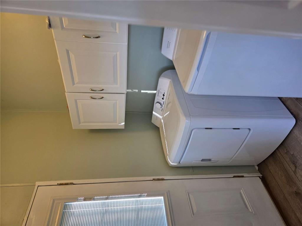 145 Rock Forge Court Jefferson, GA 30549 - Photo 9 of 22 a utility room with dryer and washer