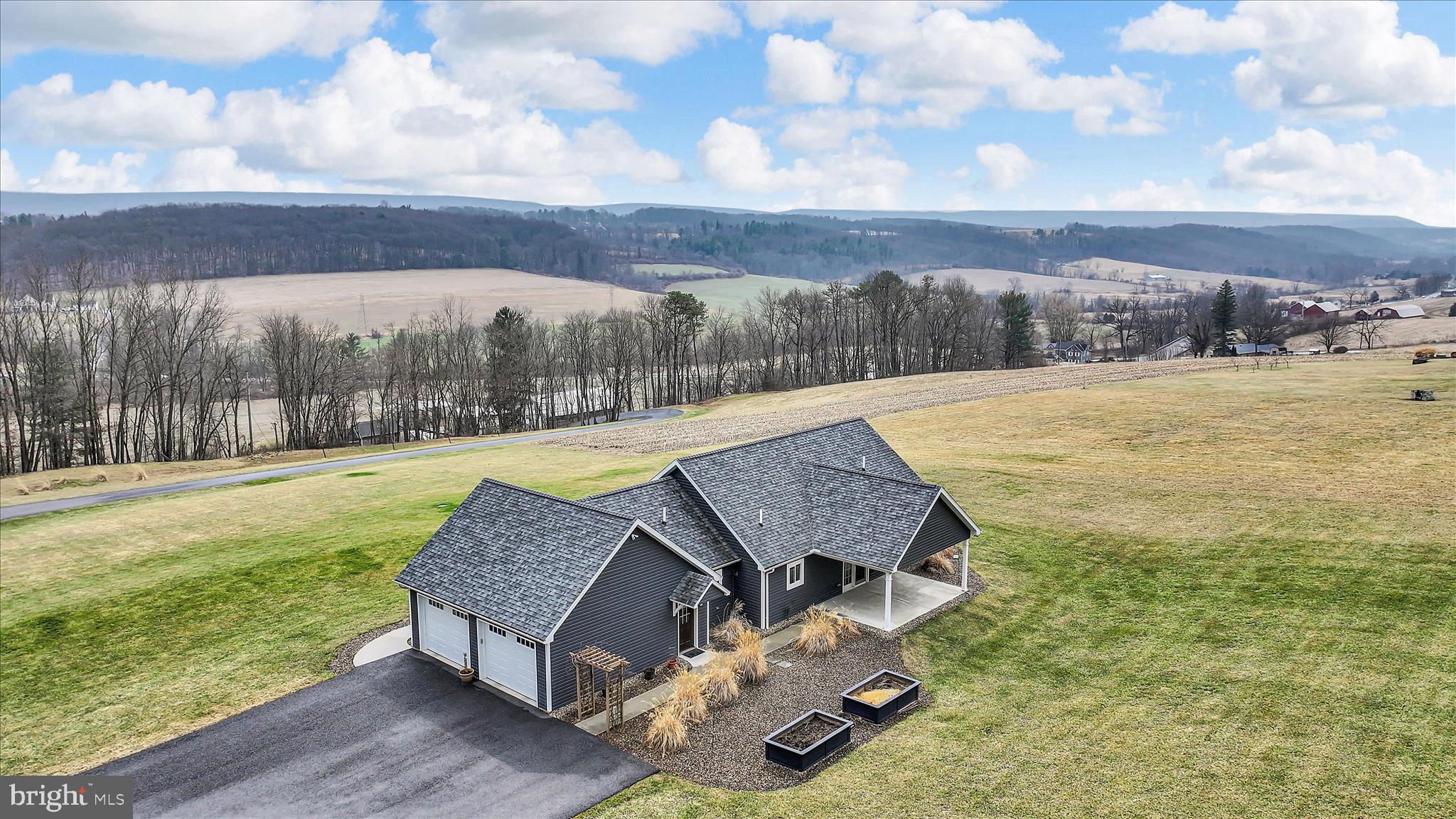 643 Deturksville Road Pine Grove, PA 17963 - Photo 11 of 59 a view of a swimming pool with an outdoor space and seating area