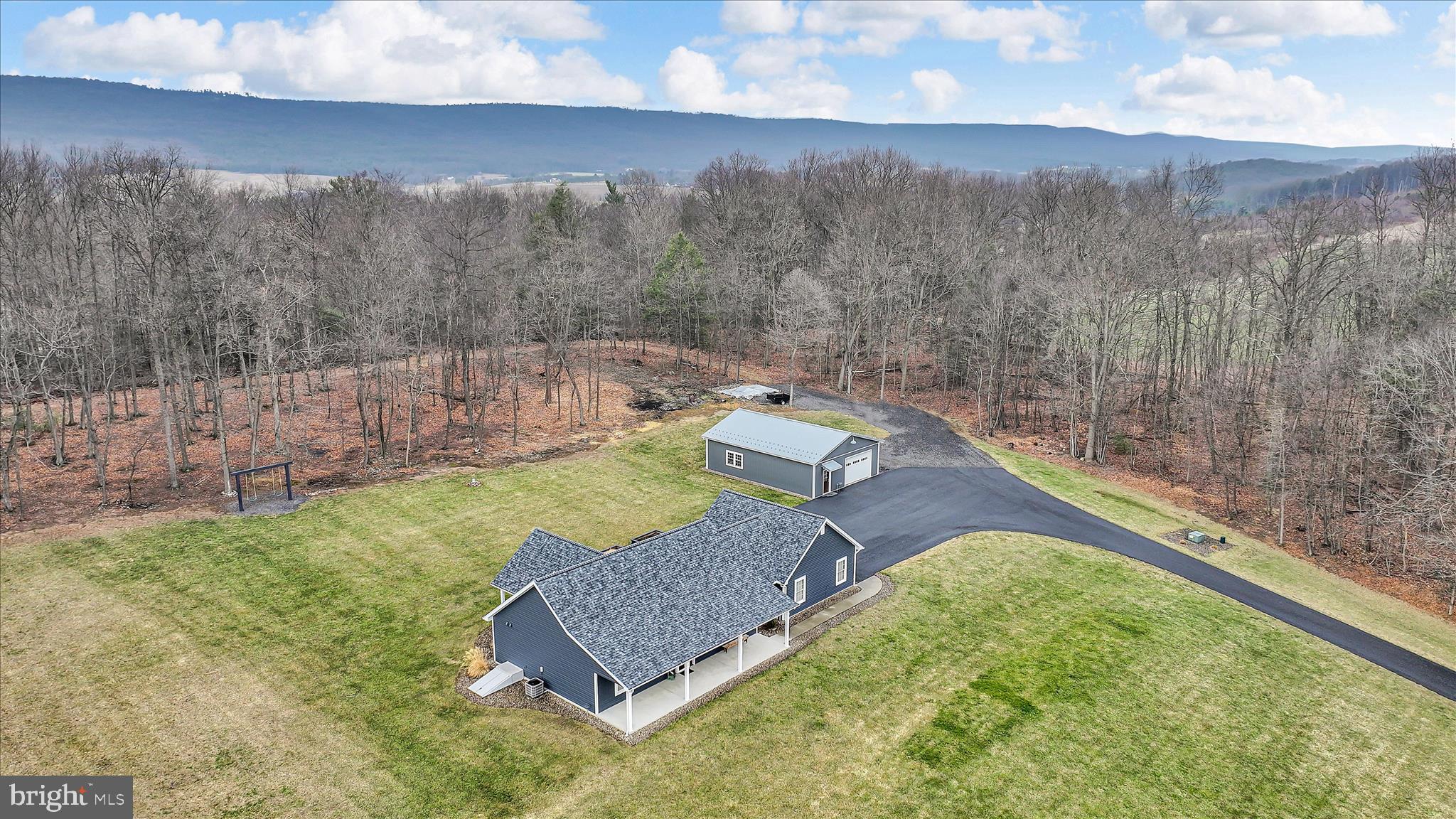 643 Deturksville Road Pine Grove, PA 17963 - Photo 13 of 59 a view of a backyard with trees