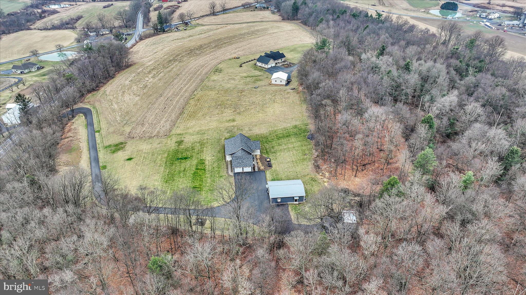 643 Deturksville Road Pine Grove, PA 17963 - Photo 16 of 59 a view of a wooden wall with a tree