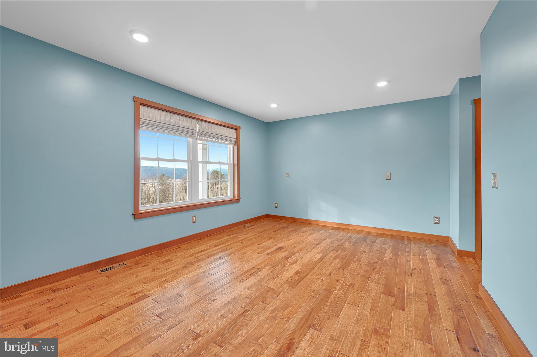 643 Deturksville Road Pine Grove, PA 17963 - Photo 25 of 59 a view of an empty room with wooden floor and a window