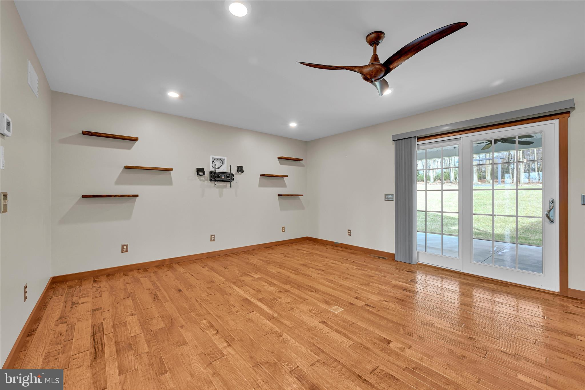 643 Deturksville Road Pine Grove, PA 17963 - Photo 27 of 59 a view of empty room with wooden floor and fan