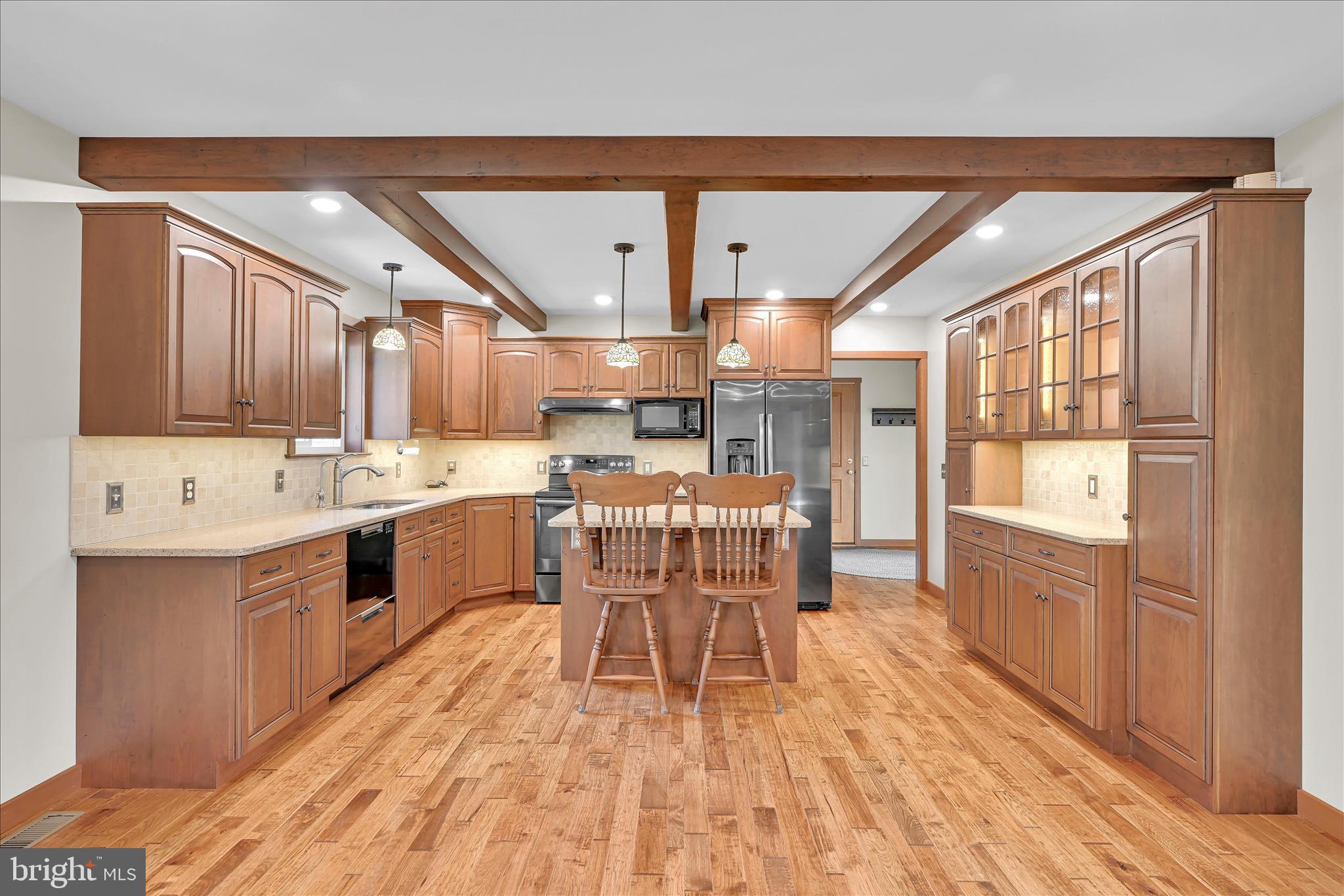 643 Deturksville Road Pine Grove, PA 17963 - Photo 29 of 59 a dining hall with stainless steel appliances kitchen island granite countertop a sink and cabinets