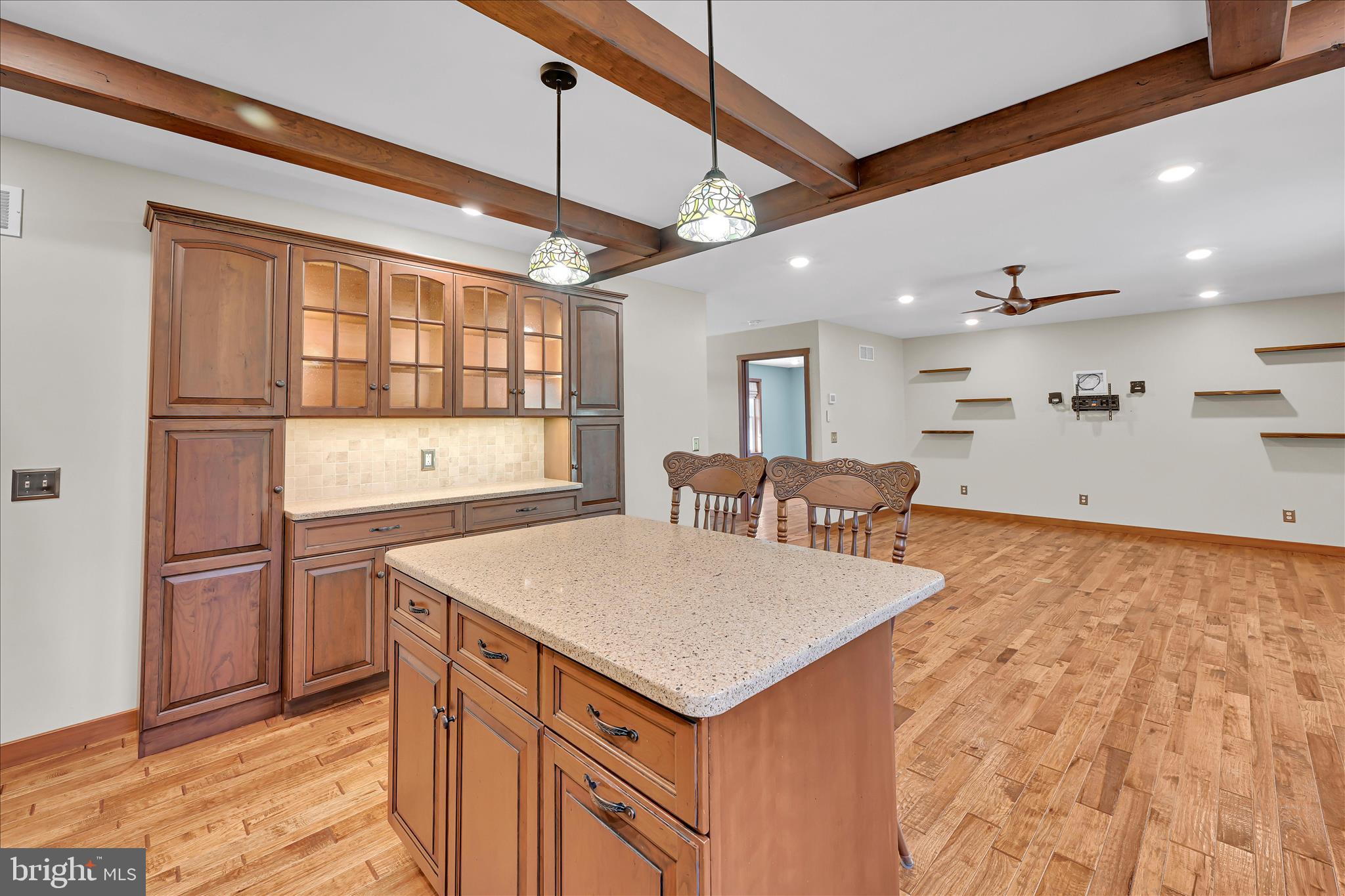 643 Deturksville Road Pine Grove, PA 17963 - Photo 32 of 59 a kitchen with a stove a refrigerator and a table