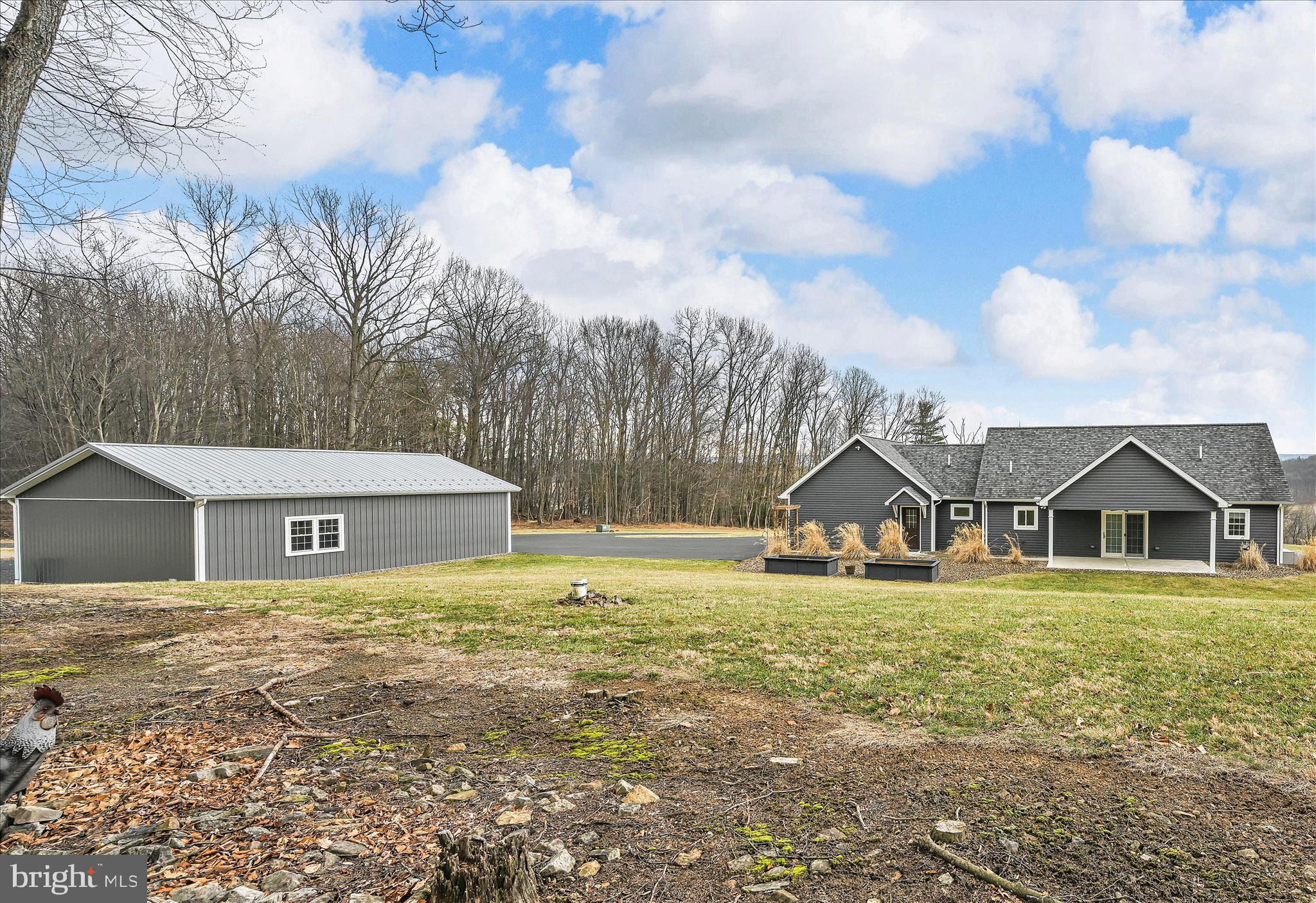 643 Deturksville Road Pine Grove, PA 17963 - Photo 51 of 59 a view of a house with a big yard and large trees
