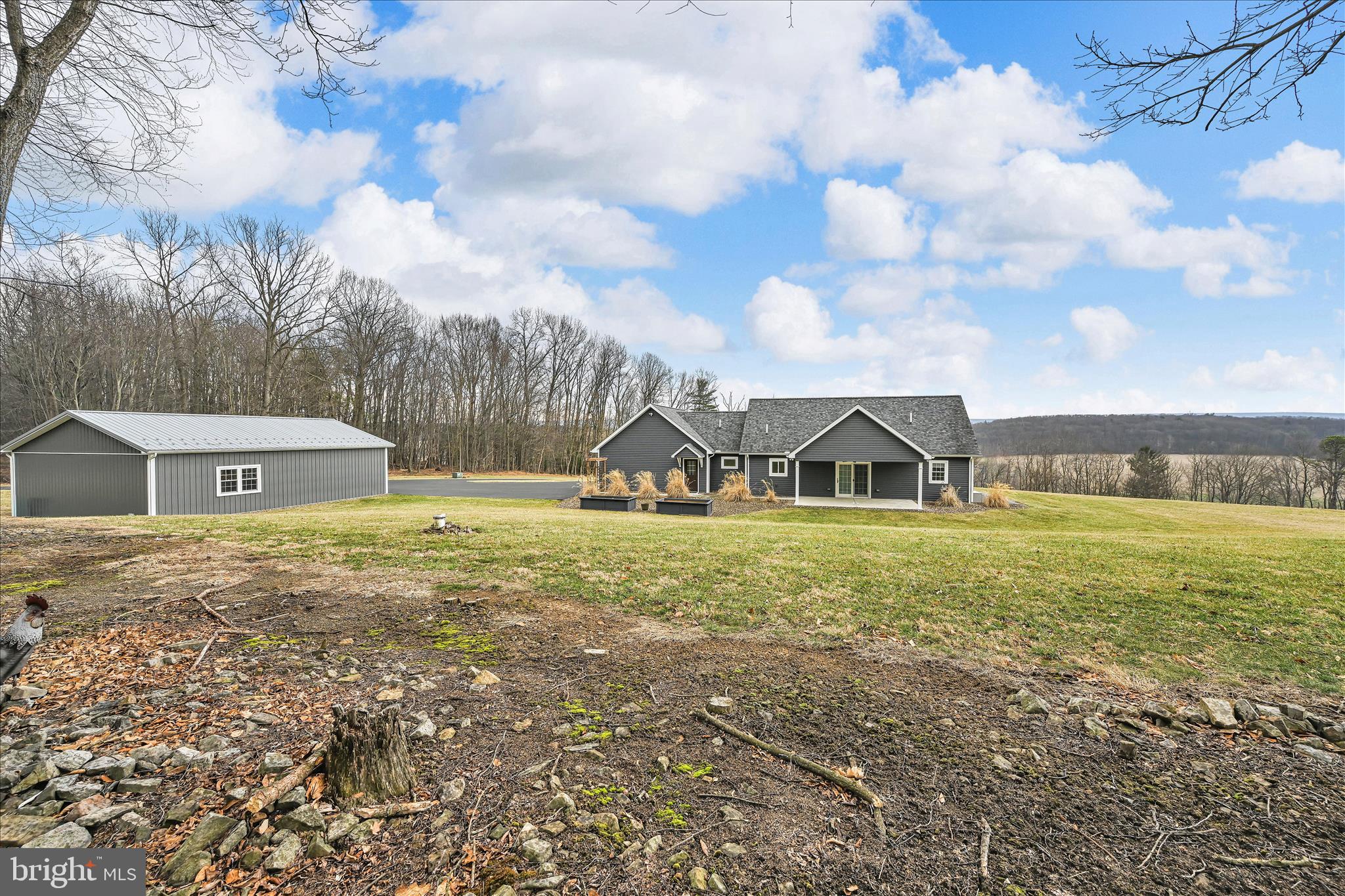 643 Deturksville Road Pine Grove, PA 17963 - Photo 52 of 59 a front view of a house with garden