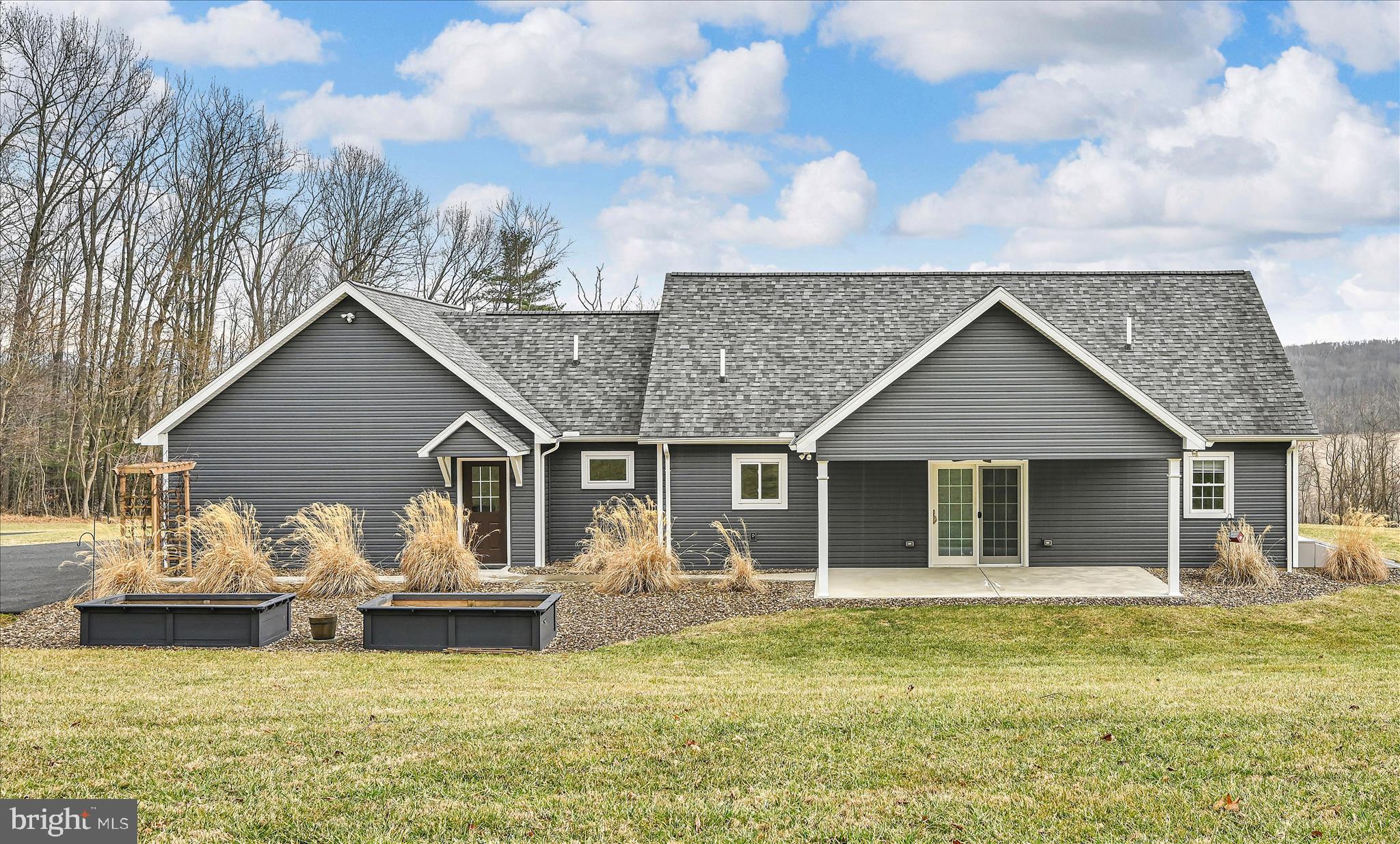 643 Deturksville Road Pine Grove, PA 17963 - Photo 53 of 59 a view of a house with swimming pool and porch