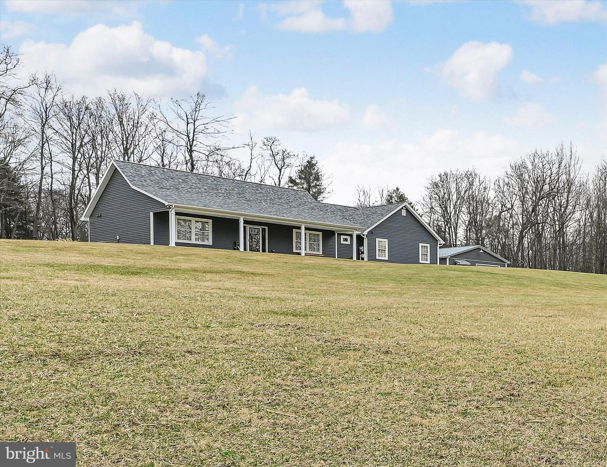 643 Deturksville Road Pine Grove, PA 17963 - Photo 6 of 59 a front view of a house with a yard