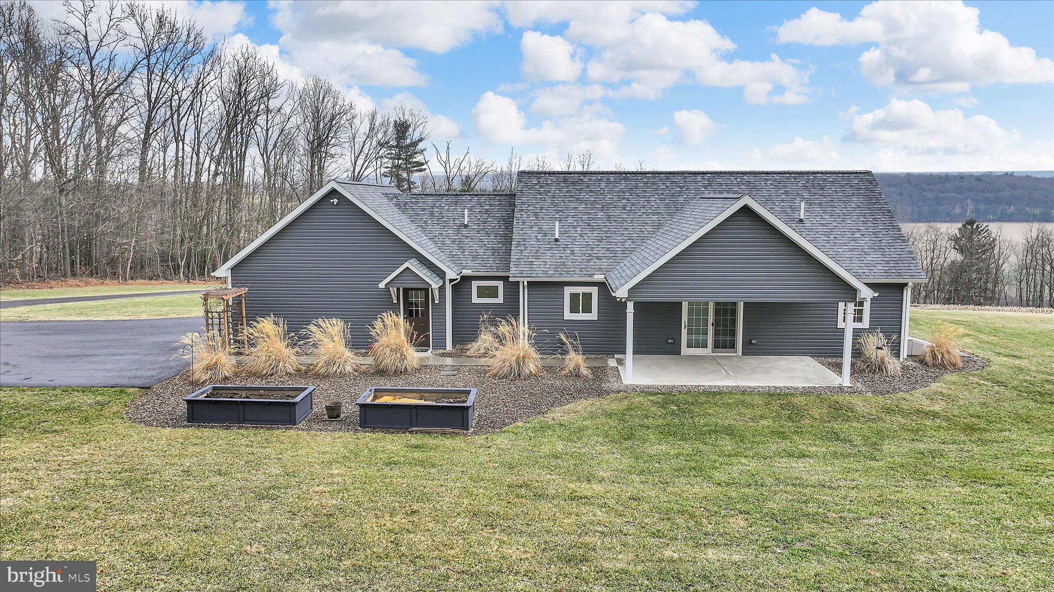 643 Deturksville Road Pine Grove, PA 17963 - Photo 8 of 59 a front view of a house with a yard