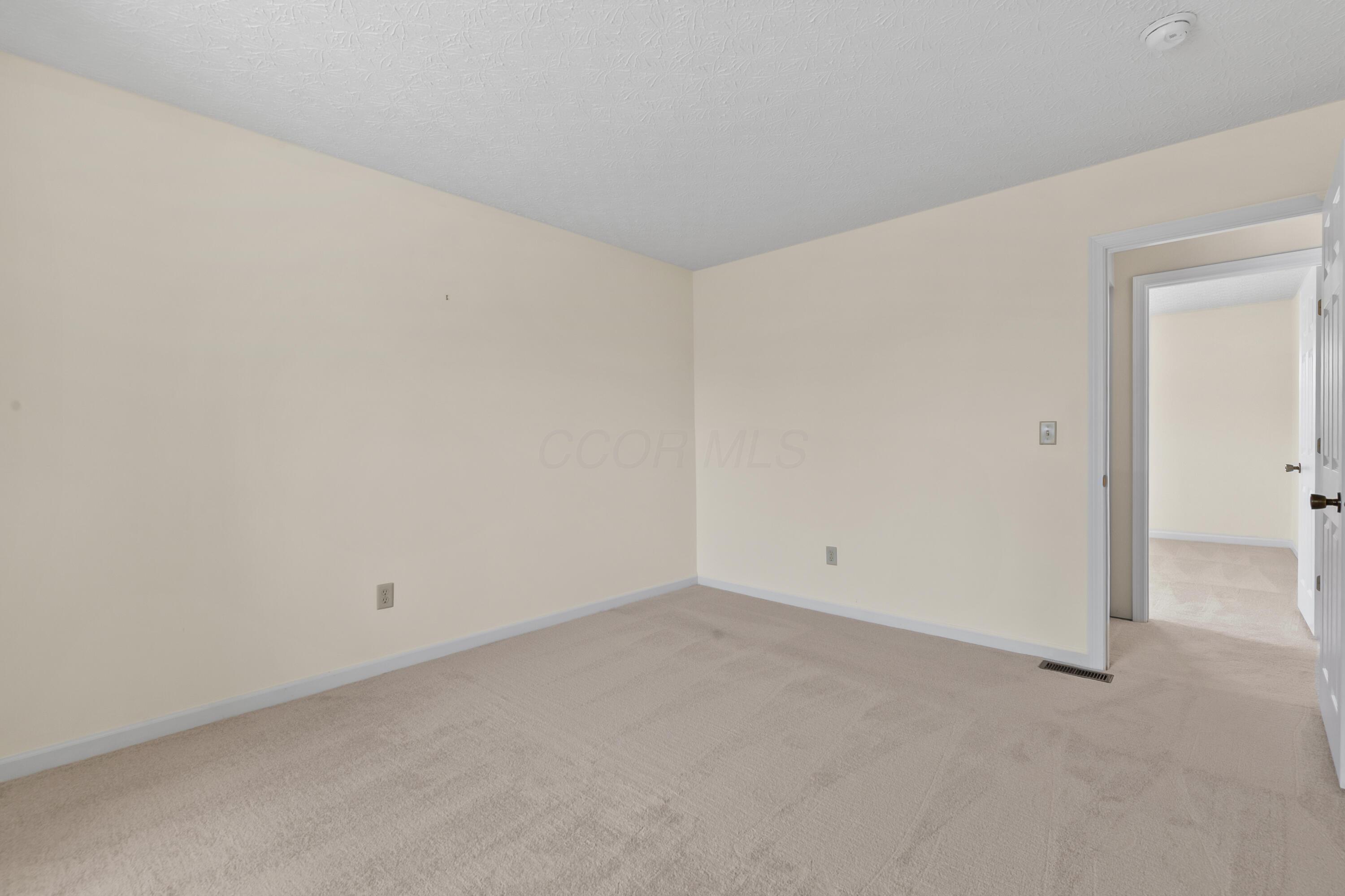 30 Tabilore Loop Delaware, OH 43015 - Photo 41 of 55 • New light sand carpet ~ 2025 • Ivory painted walls • (2) closets with bi-fold doors • Mini blinds